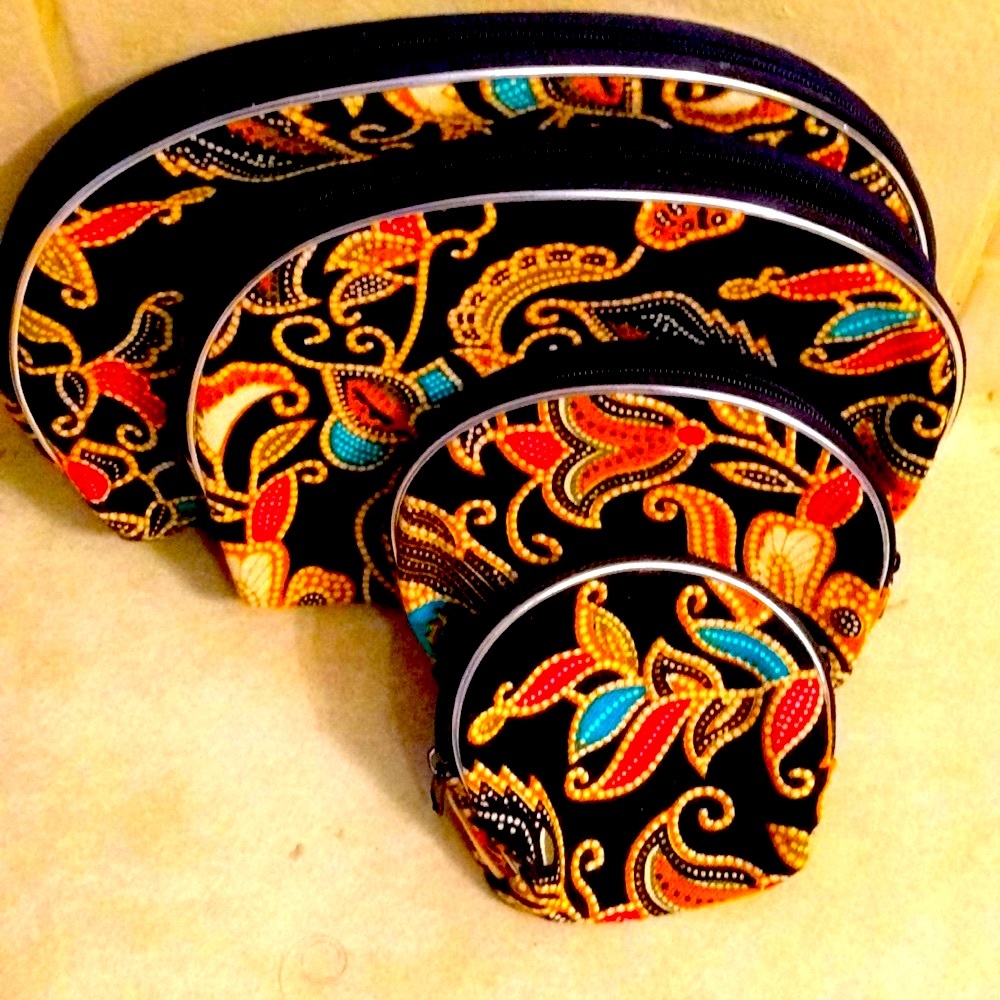 NWOT batik print cosmetic and coin pouch.